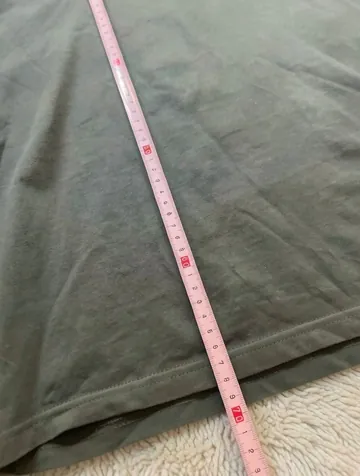 The tape measure down the length of the item